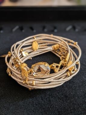 Smadar Eliasaf (SEA) wrap-around leather bracelet features multiple light-color